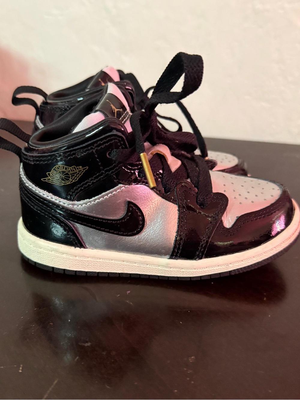 Jordan Kids' Black and Silver High-Top Sneakers with Gold Accent